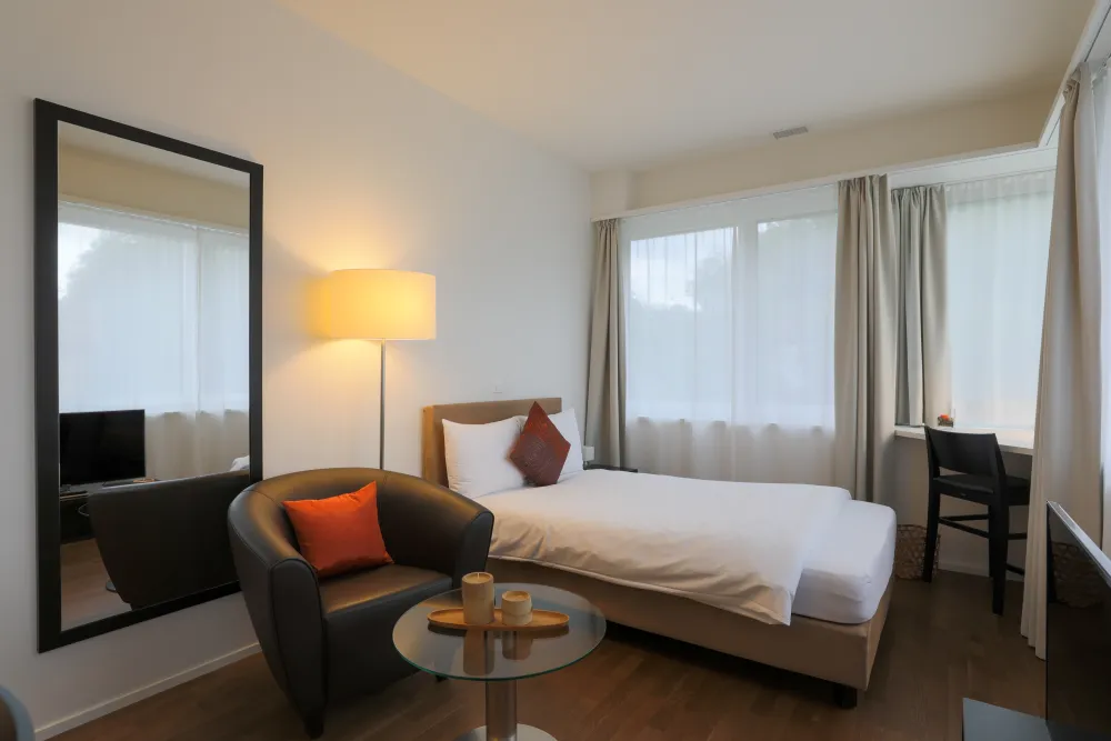 Apartment of category smart corner room sleeping and living area